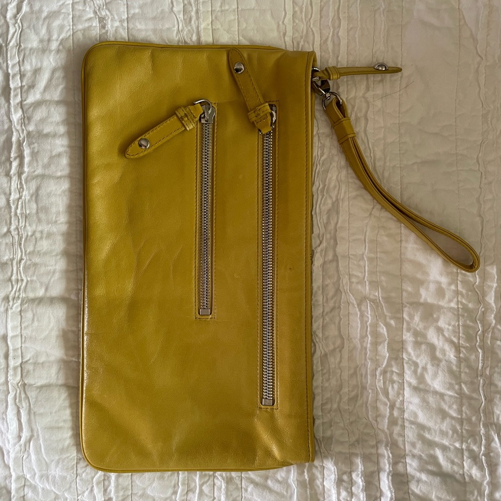 Yellow, HOBO clutch with zipper accents. 14”x7.5”.